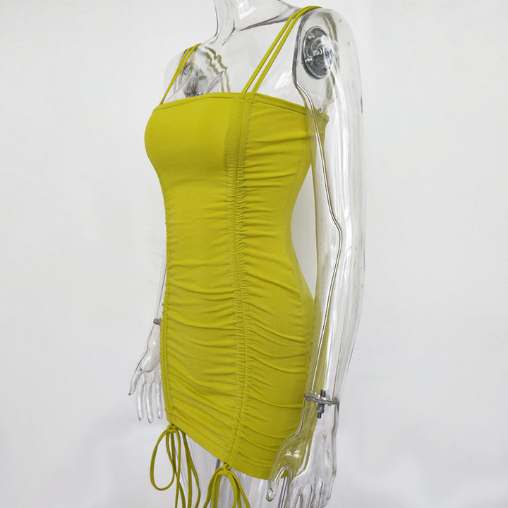 Yellow dress on a transparent mannequin against a white background