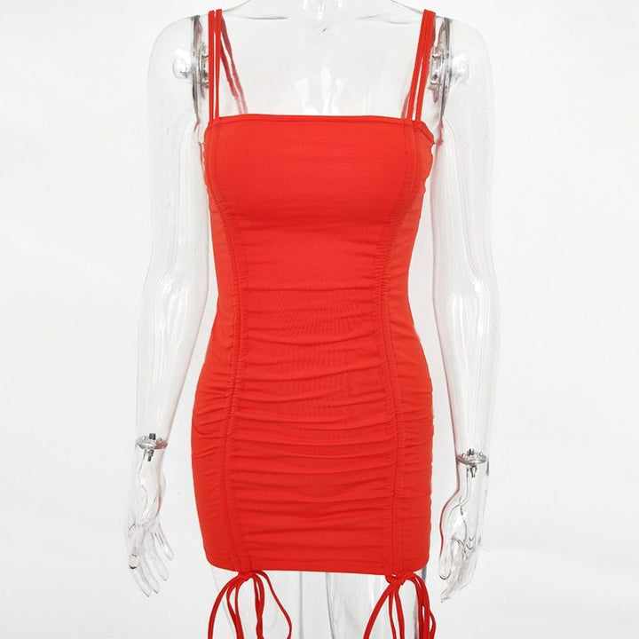 Red dress on a transparent mannequin against a white background