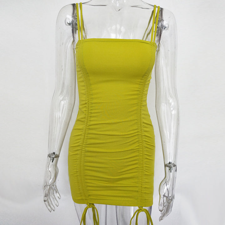 Yellow dress on a transparent mannequin against a white background