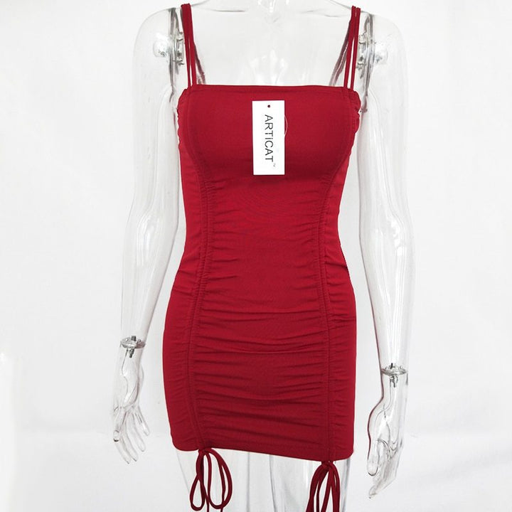Red dress on a transparent mannequin with a visible brand label against a white background