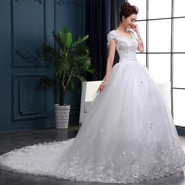 Elegant Long‑Tail Wedding Dress for Modern Brides