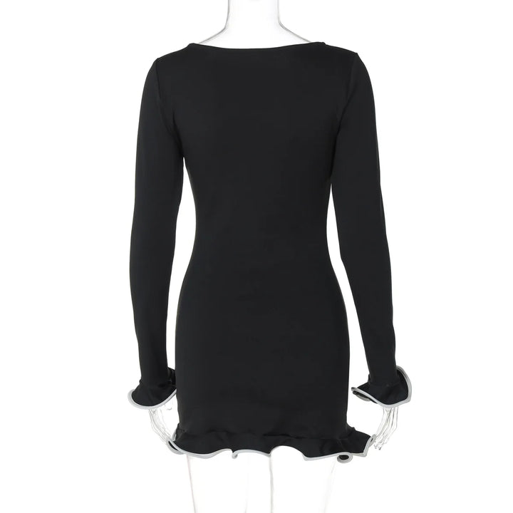 Black dress on a mannequin with a white background