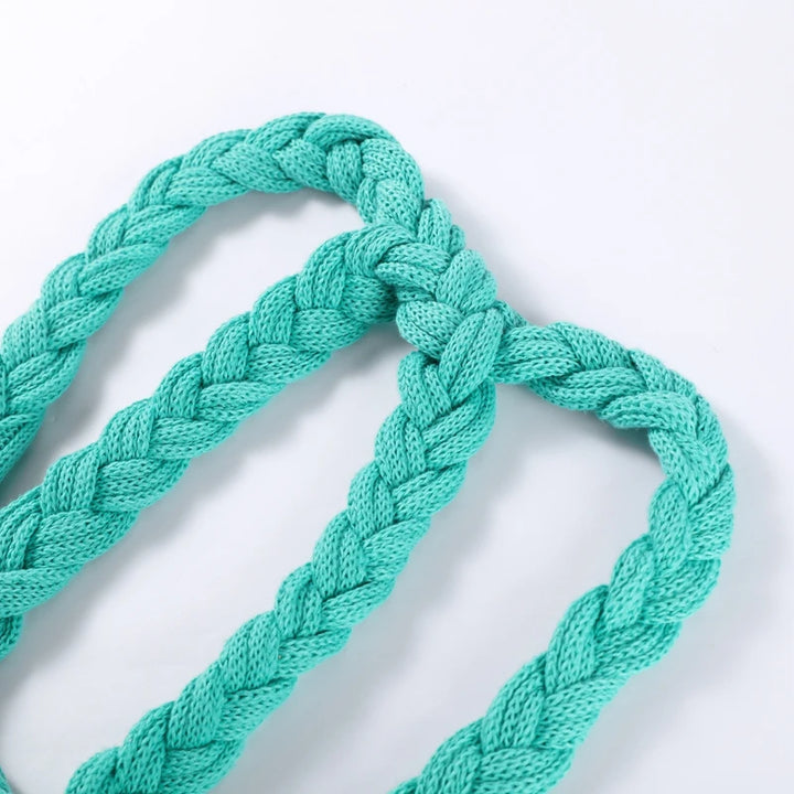 Turquoise braided rope on a white background