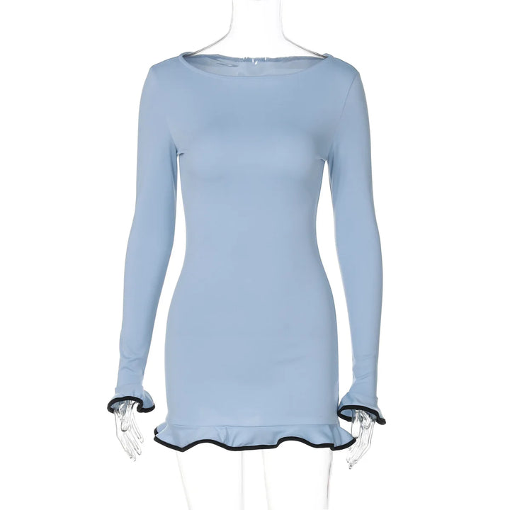 Light blue dress with ruffled hem on a white background