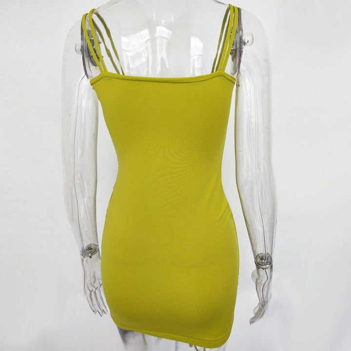 Yellow dress on a transparent mannequin against a white background